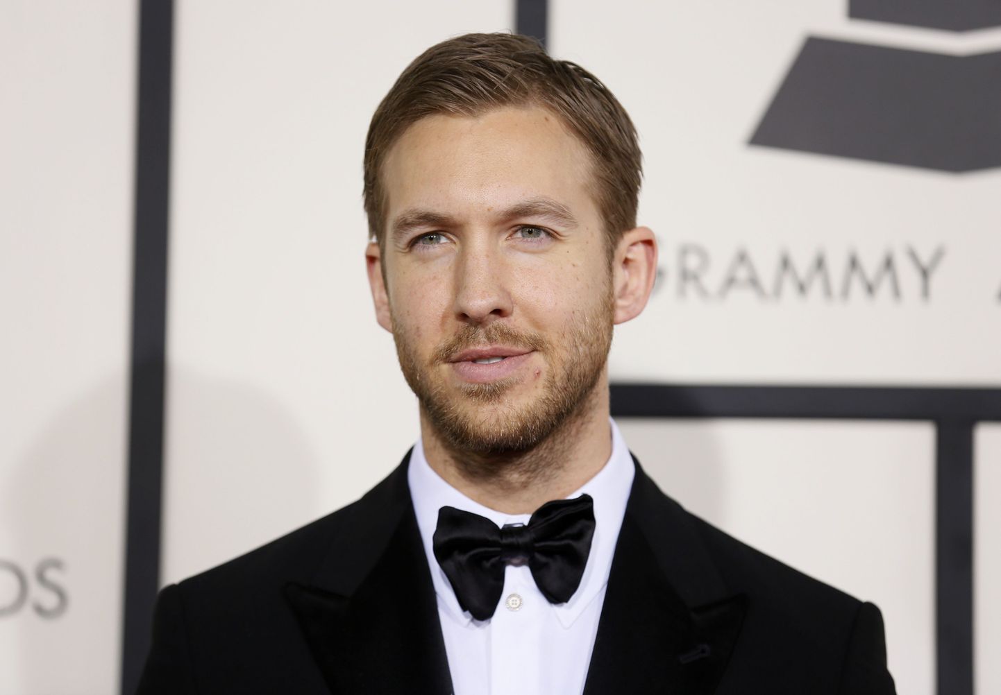 Singer Calvin Harris arrives at the 56th annual Grammy Awards in Los Angeles, California January 26, 2014.     REUTERS/Danny Moloshok (UNITED STATES TAGS: ENTERTAINMENT) (GRAMMYS-ARRIVALS)