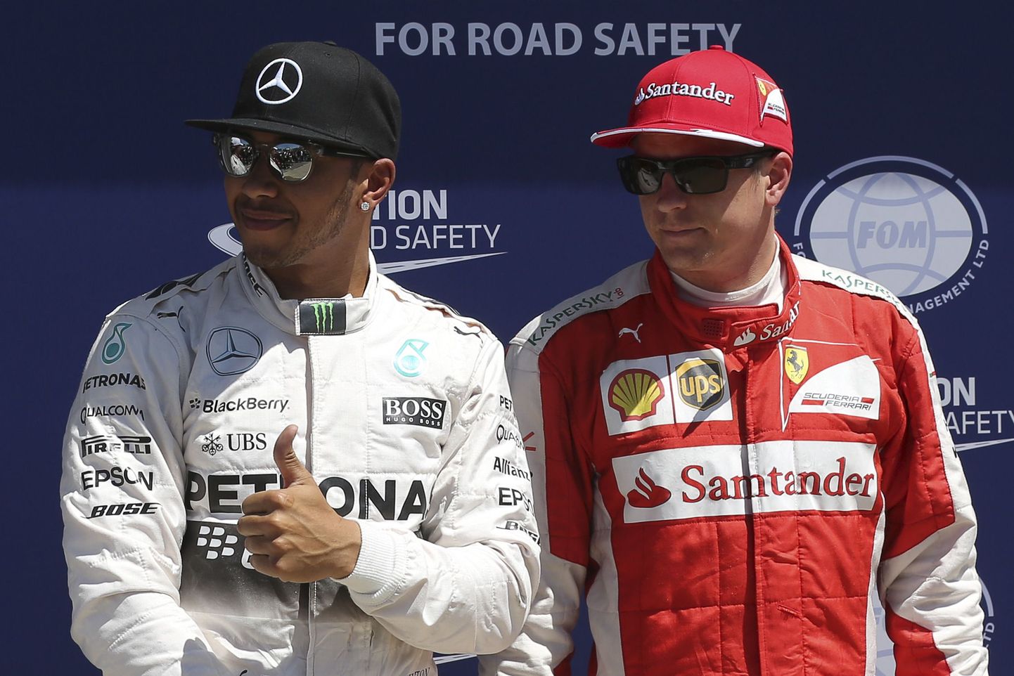 Lewis Hamilton ja Kimi Räikkönen.