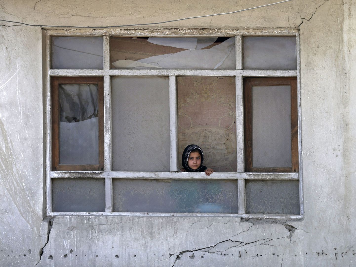 Afgaani tüdruk Kabulis pärast pommitamist.