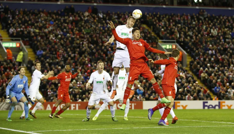 Football Soccer - Liverpool v FC Augsburg - UEFA Europa League Round of 32 Second Leg - Anfield, Liverpool, England - 25/2/16
Liverpool's Roberto Firmino in action with Augsburg's Ragnar Klavan
Action Images via Reuters / Carl Recine
Livepic
EDITORIAL USE ONLY.