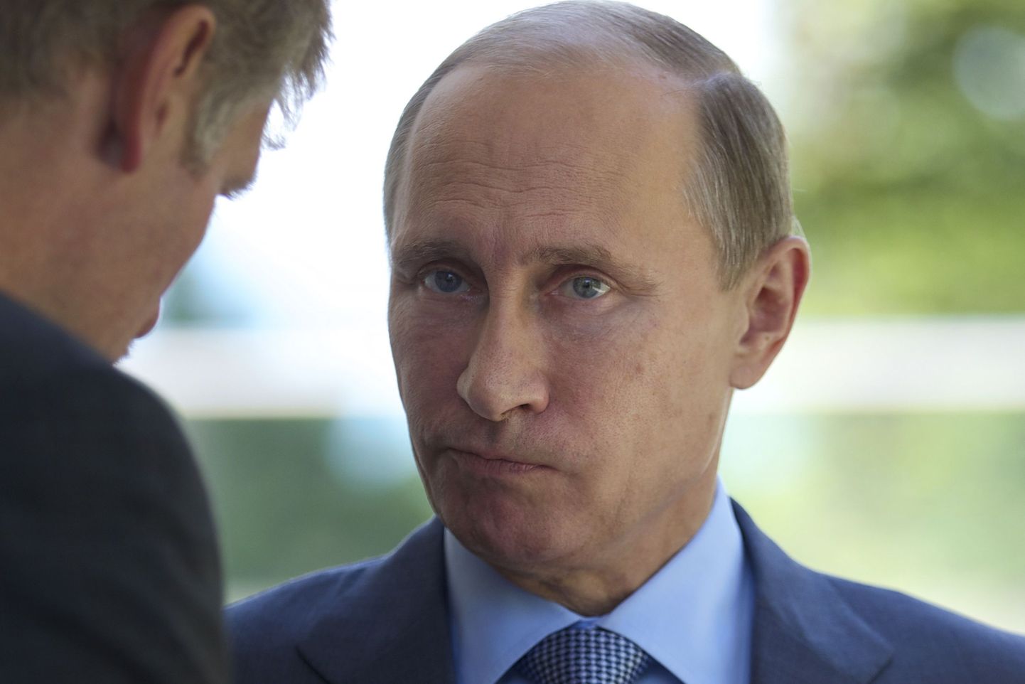 Vene president Vladimir Putin ja Kremli pressisekretär Dmitri Peskov.