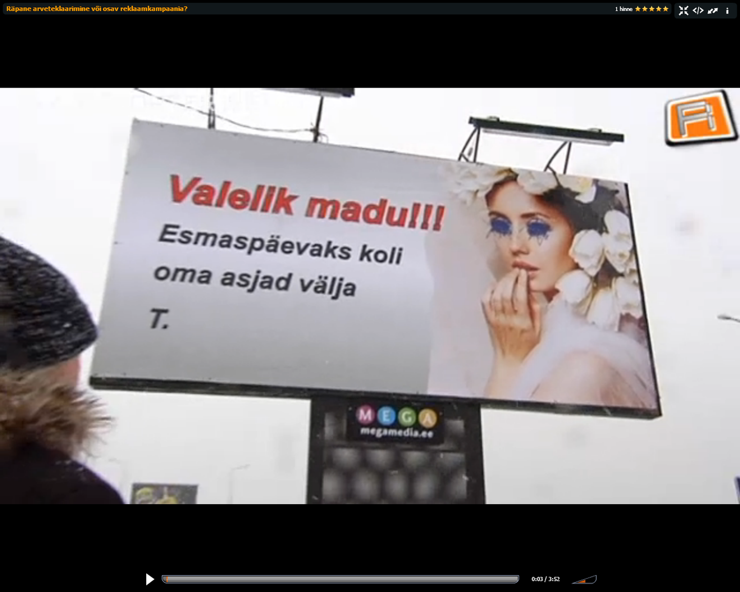 Tiheda liiklusega Pirita tee ja Pärnu maantee äärs ripuvad üleval päris raju tekstiga suured reklaamplakatid
