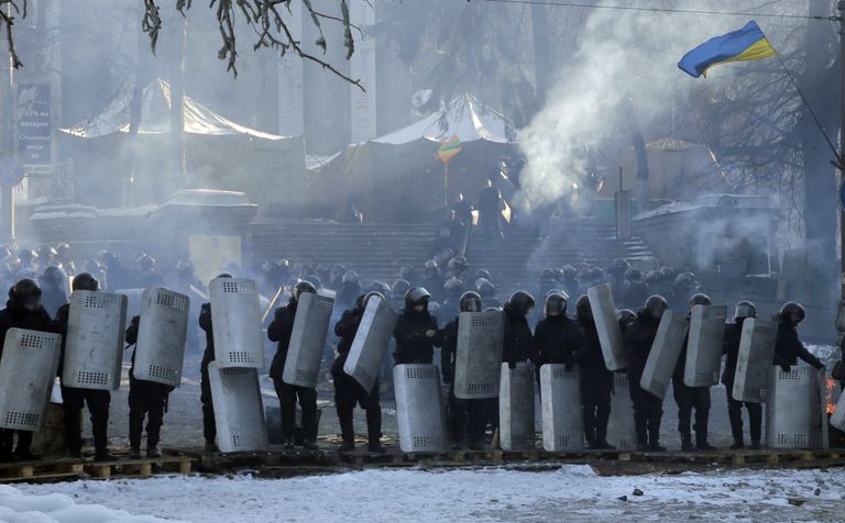 Märulimiilitsad Kiievi kesklinnas 30. jaanuaril. / Scanpix