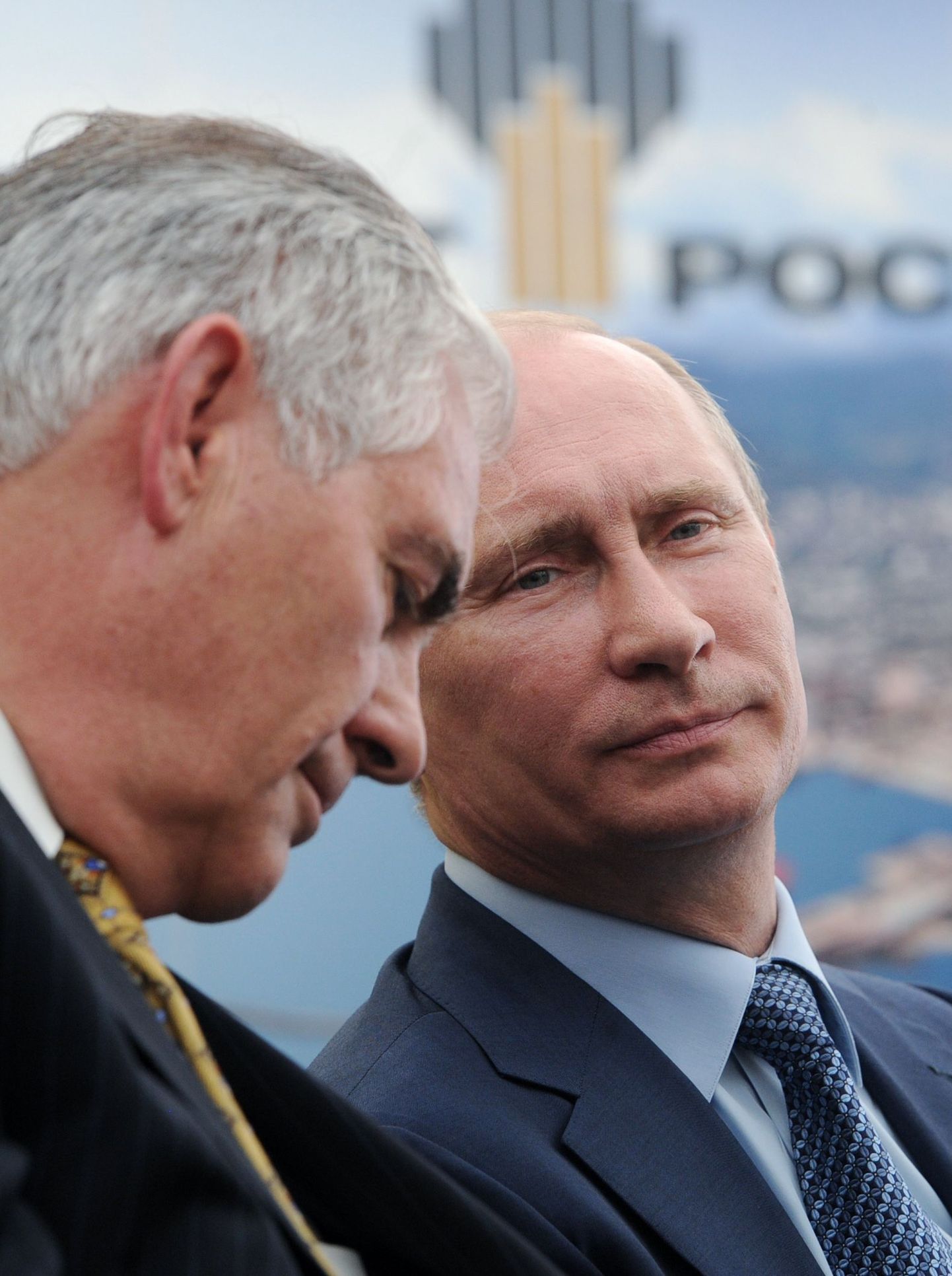 Exxon Mobile tegevjuht Rex Tillerson ja Venemaa president Vladimir Putin.