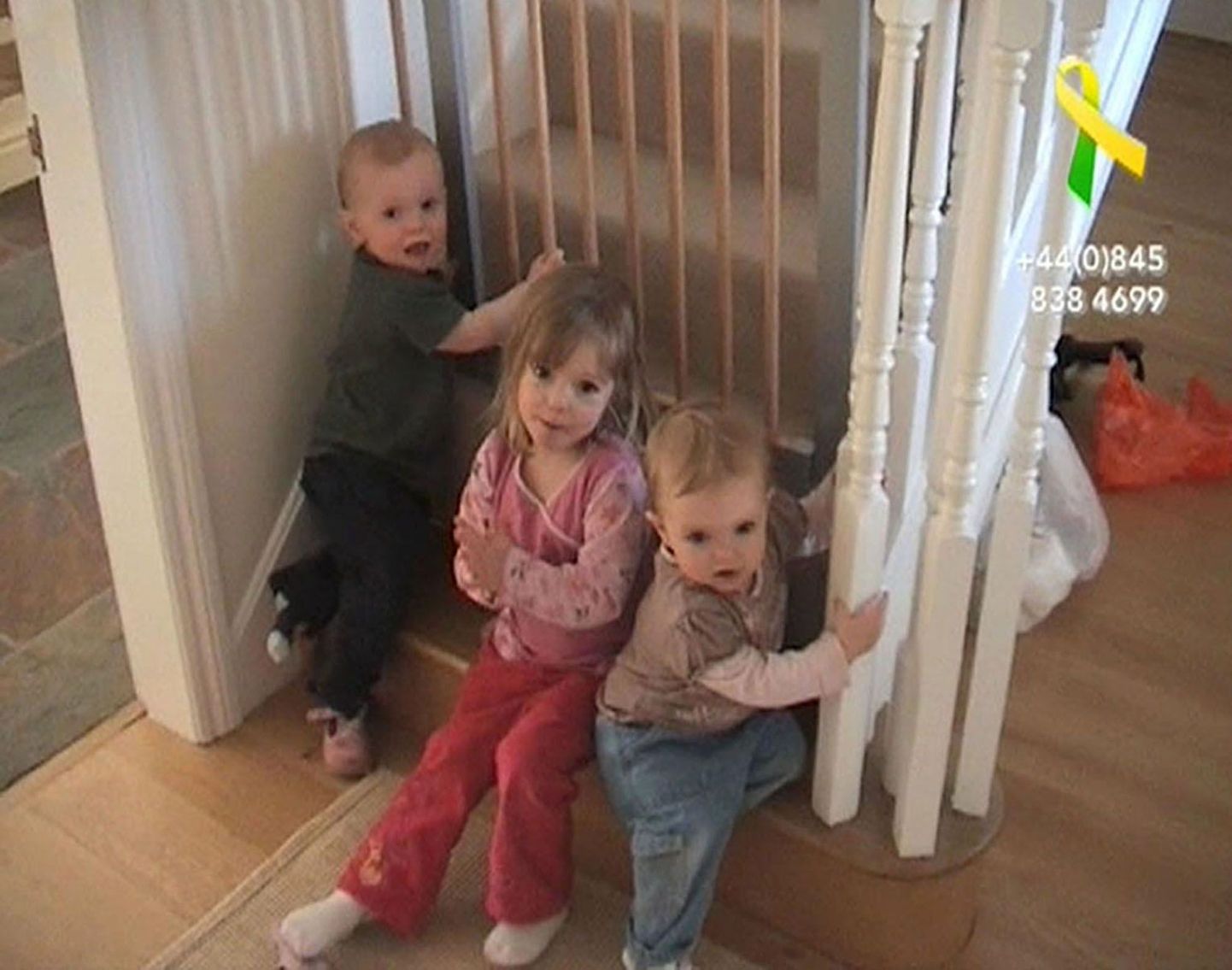 Madeleine McCann (keskel) koos oma venna Seani (vasakul) ja õe Amelie'ga.