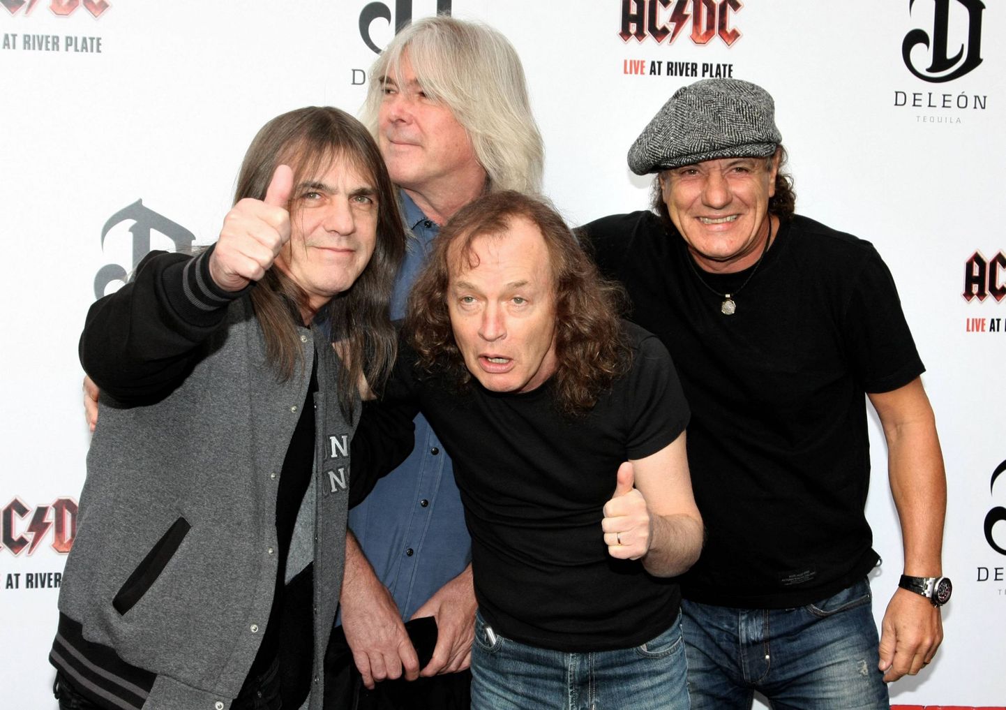 AC/DC. Малькольм Янг, Клифф Уильямс, Ангус Янг и Брайан Джонсон.