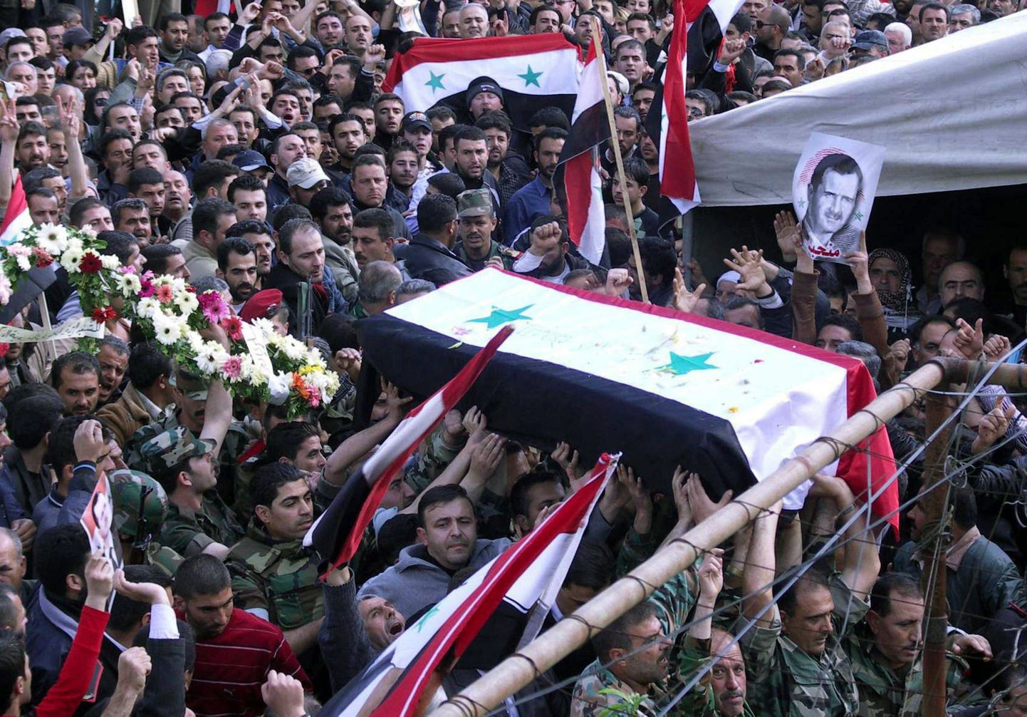 Süüria rahutustes tapetud meeleavaldaja matused.