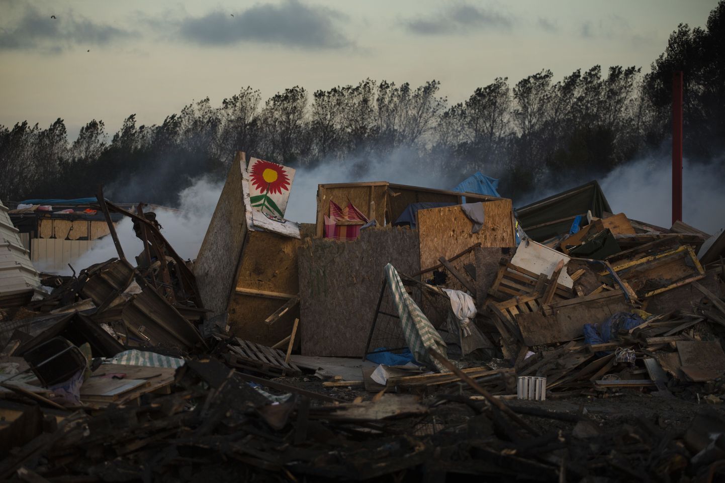Hävitatud Calais` põgenikelaager.