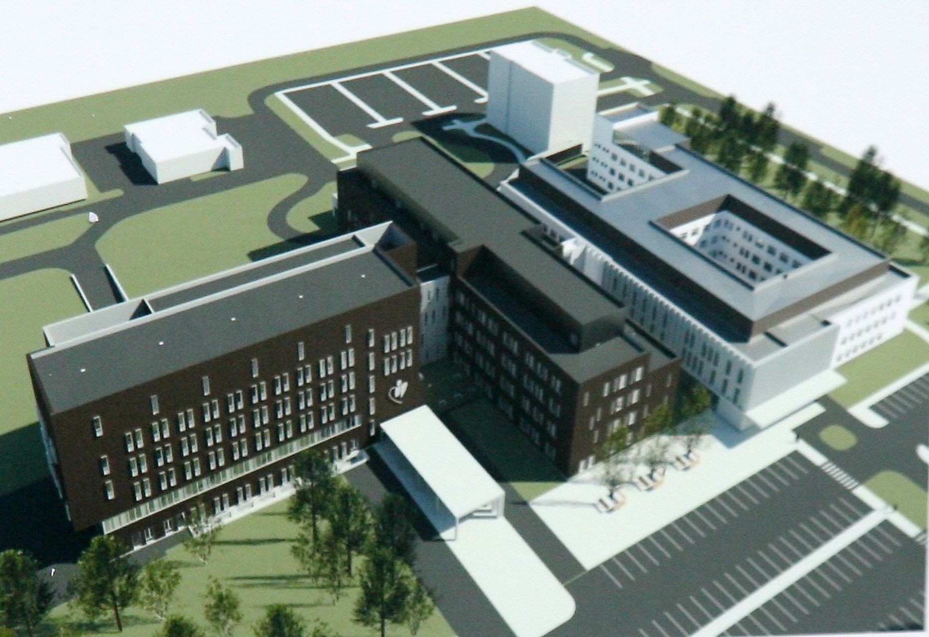 Новое больничное здание (на эскизе слева) появится рядом с лечебным корпусом, построенным в 2013 году.
