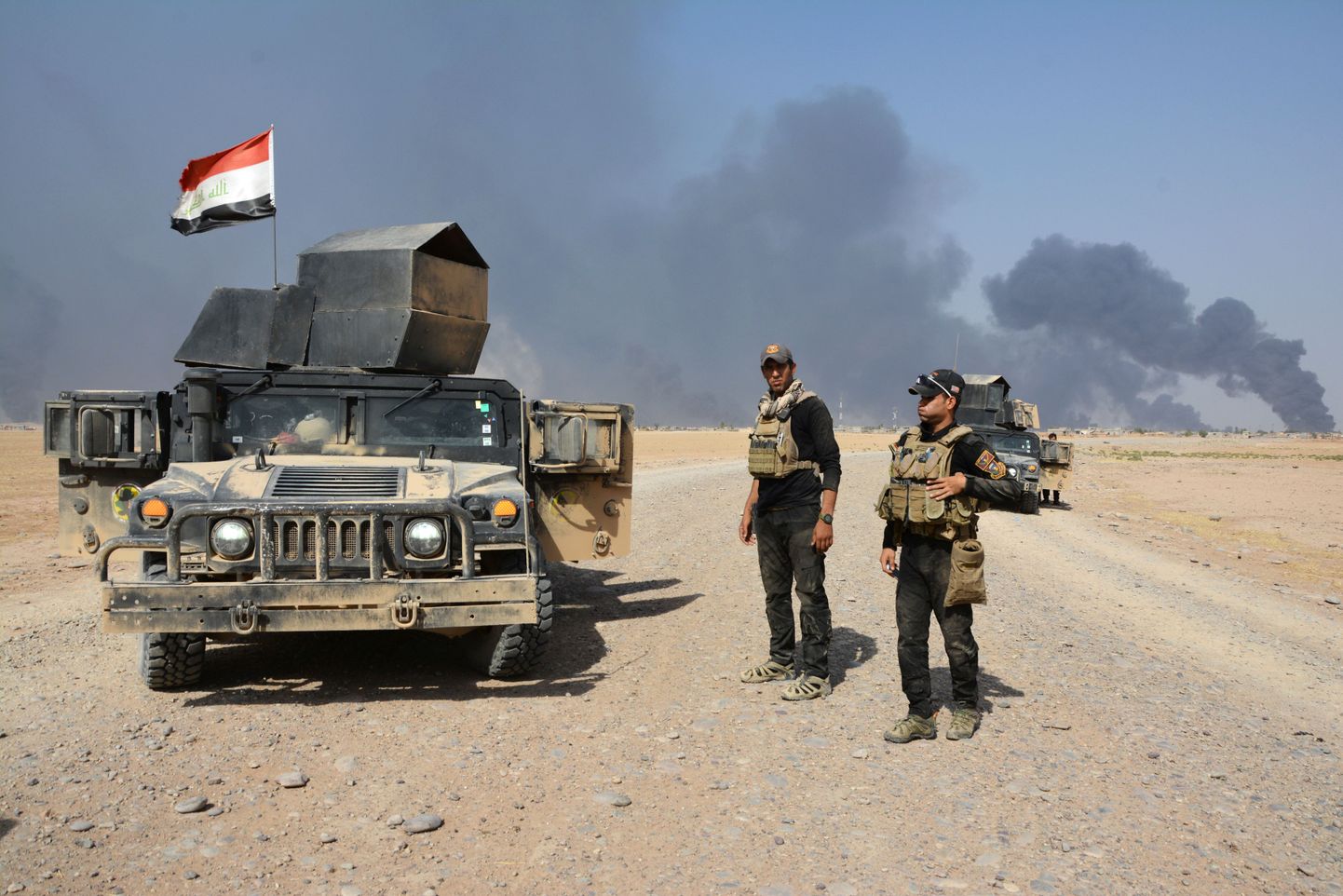 Iraagi valitsusväed Qayyarah lähistel.