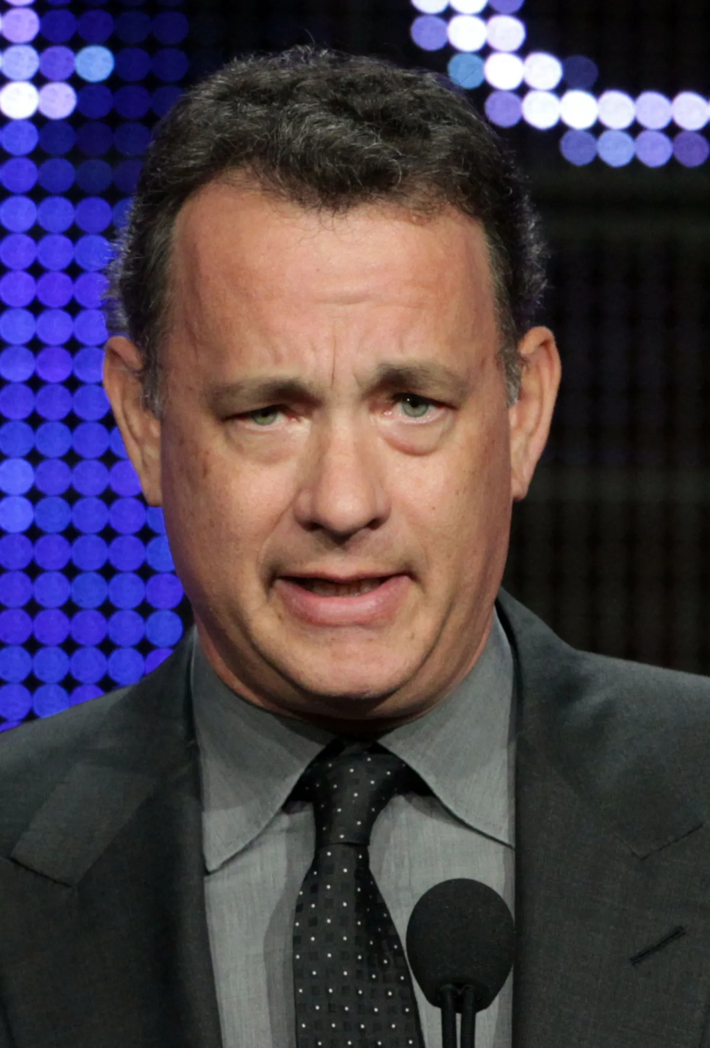 BEVERLY HILLS, CA - JULY 31: Executive Producer Tom Hanks accepts the award for "Outstanding Achievement in Movies, Miniseries and Specials" for "The Pacific" onstage during the 26th Annual Television Critics Association Awards at the Beverly Hilton Hotel on July 31, 2010 in Beverly Hills, California.   Frederick M. Brown/Getty Images/AFP