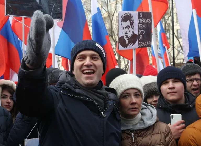 Алексей и Юлия Навальные на марше памяти Бориса Немцова в Москве, 2018 год.