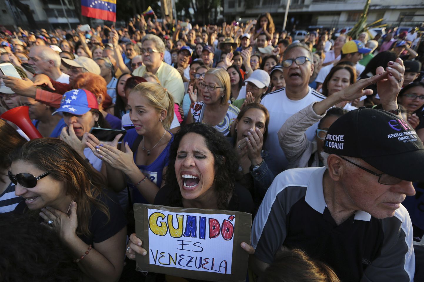 Venezuela opositsiooni toetajad Caracases meelt avaldamas.