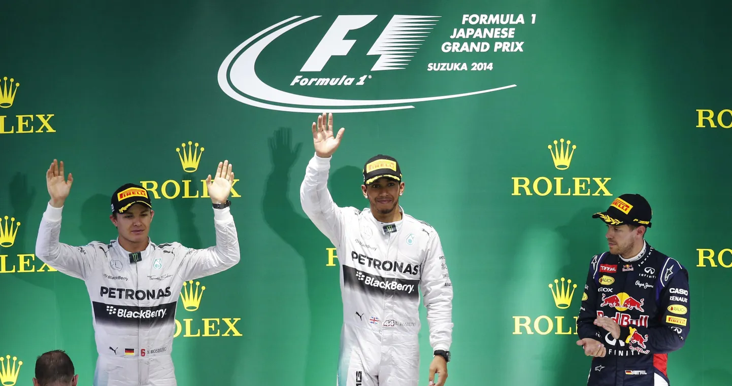 Nico Rosberg (vasakul), Lewis Hamilton (keskel) ja Sebastian Vettel.