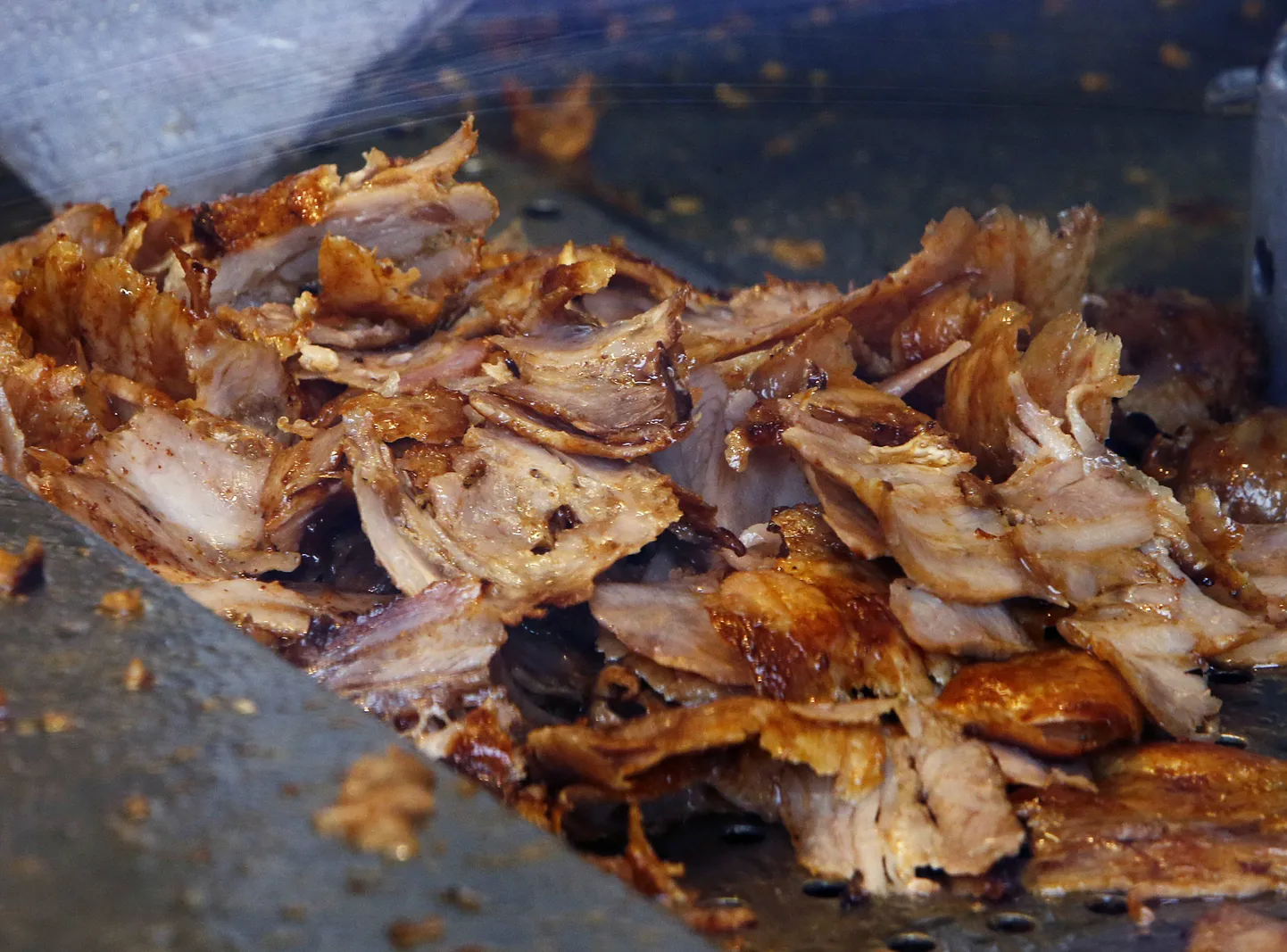 Slices of meat carved from a rotisserie Doner spit wait to be used inside a Doner restaurant in Frankfurt, Germany, Thursday, Nov. 30, 2017.   The European Union