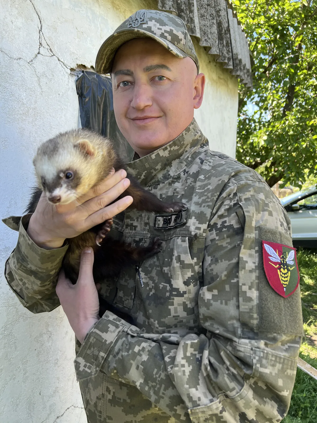 Aleksei with his "psychologist ferret" named Stinger.