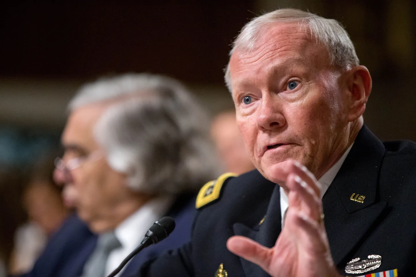 Joint Chiefs Chairman Gen. Martin Dempsey, right, testifies on Capitol Hill in Washington, Wednesday, July 29, 2015, before the Senate Armed Services Committee hearing on the impacts of the Joint Comprehensive Plan of Action (JCPOA) on U.S. Interests and the Military Balance in the Middle East. Energy Secretary Ernest Moniz is at left. (AP Photo/Andrew Harnik)