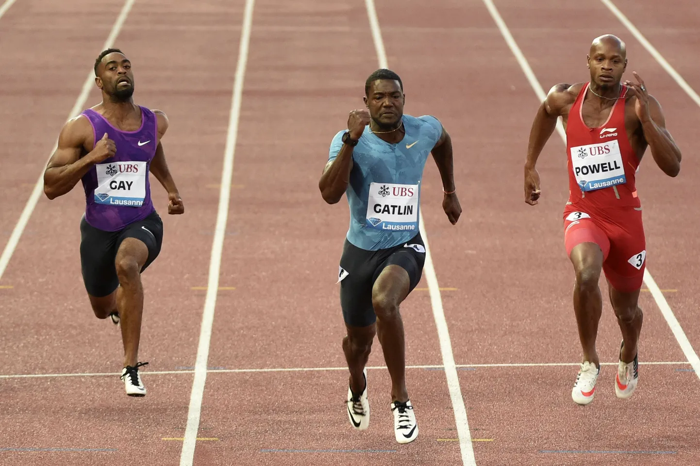 Vasakult: Tyson Gay, Justin Gatlin, Asafa Powell.
