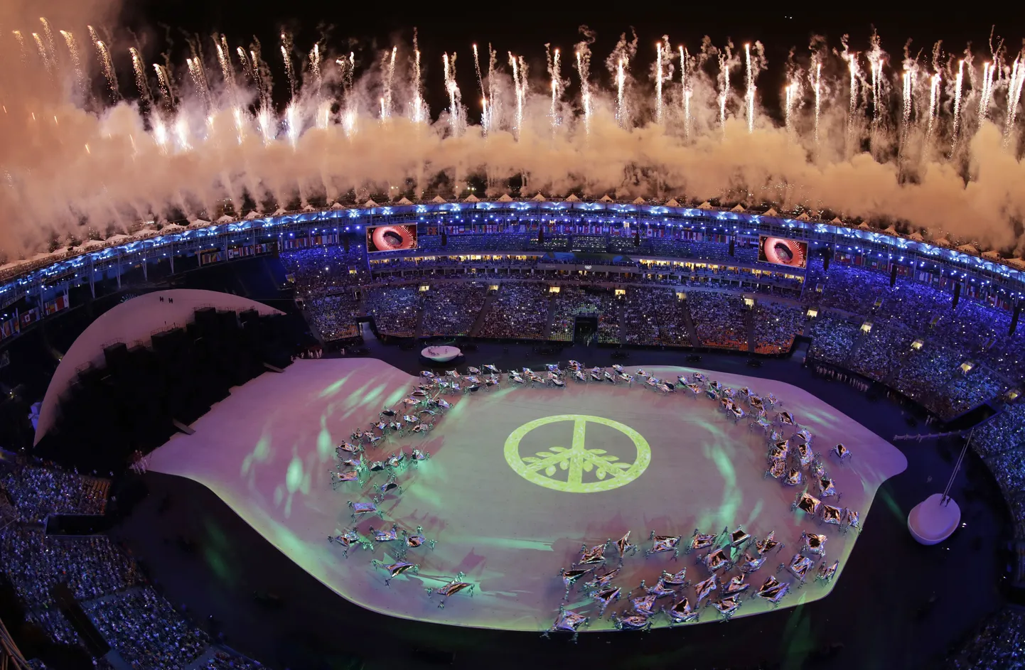 Fireworks are seen over Maracana Stadium during the opening ceremony at the 2016 Summer Olympics in Rio de Janeiro, Brazil, Friday, Aug. 5, 2016. (AP Photo/Morry Gash)