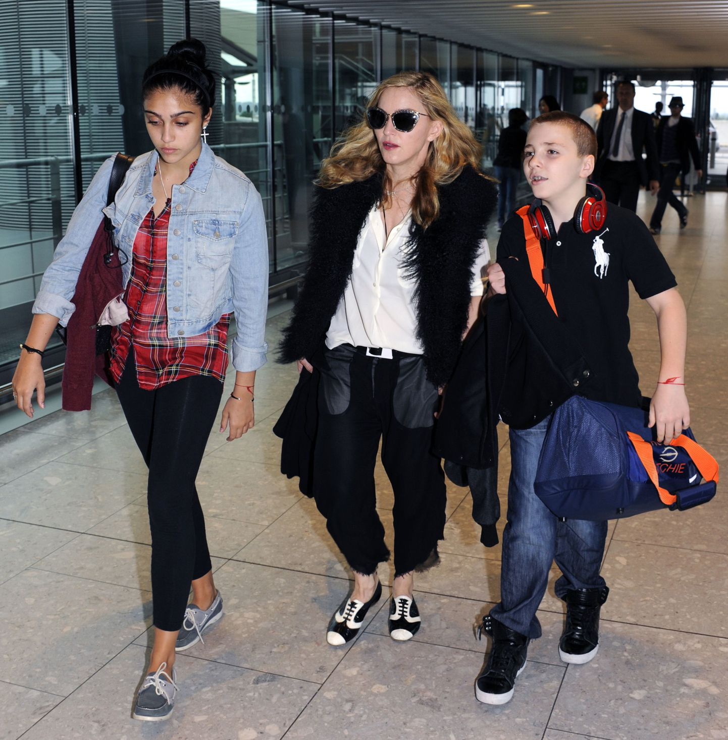 Мадонна с дочерью Лурдес и сыном Рокки.