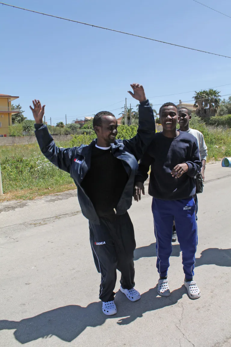 Muhammed and Ahmed are demonstrating their emotions as Europe emerged on horizon, its housetops and ships.