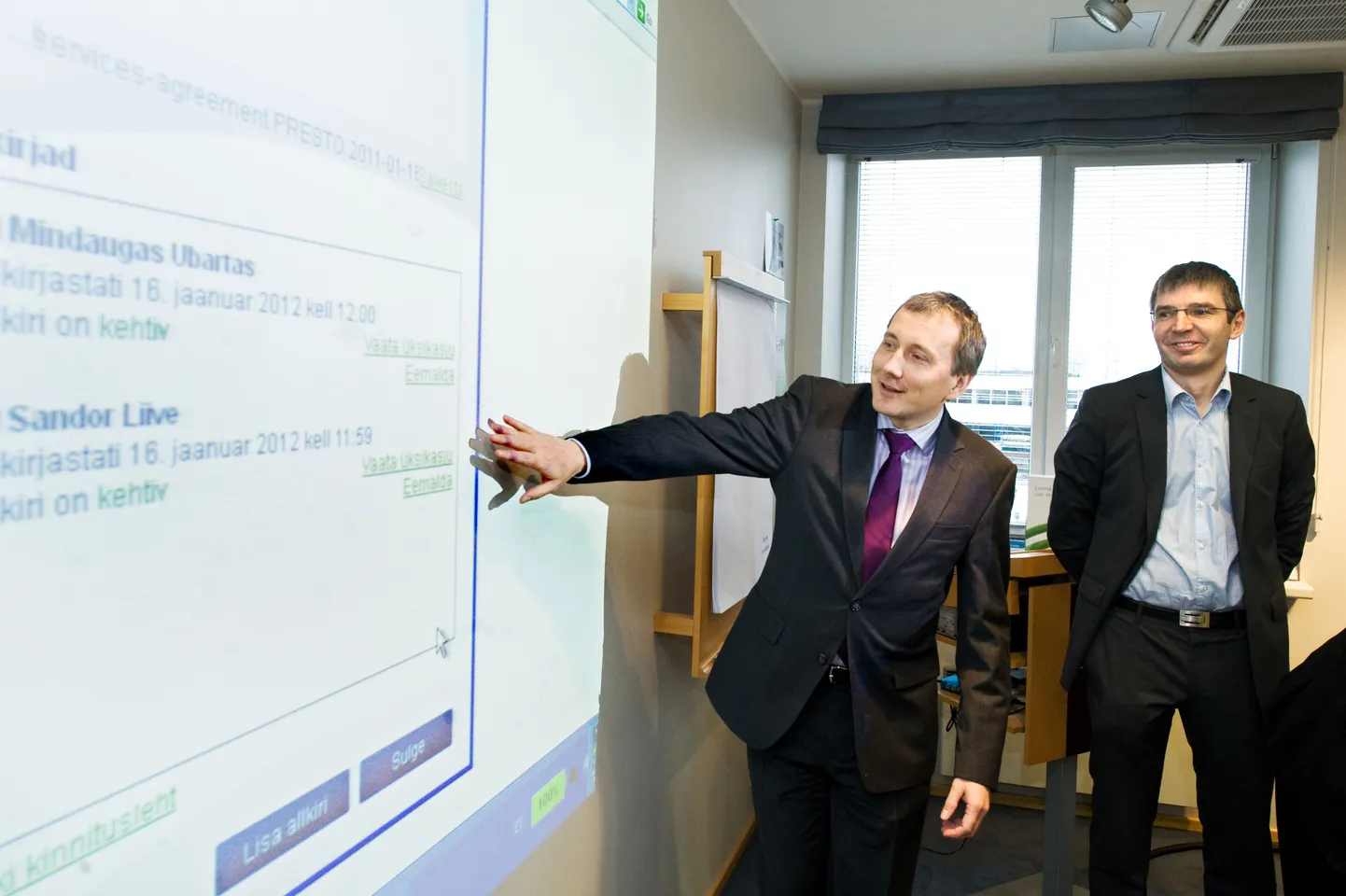 Eesti Energia juht Sandor Liive ja Tele2 juhatuse esimees Mindaugas Ubartas.