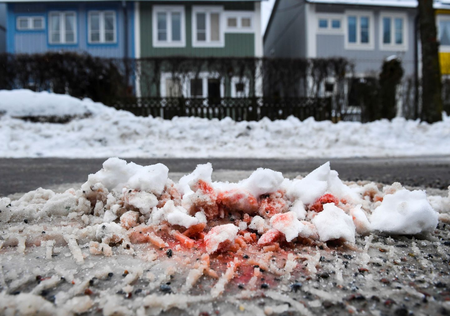 A splash of blood on the street where two men in their 20s were shot dead Wednesday night while sitting in a car in a Stockholm suburb Kista, where feuds between criminal gangs fighting over territory have taken place, police officials said, in Stockholm, Sweden, Thursday March 9, 2017. TT NEWS AGENCY/Pontus Lundahl via REUTERS    ATTENTION EDITORS - THIS IMAGE WAS PROVIDED BY A THIRD PARTY. FOR EDITORIAL USE ONLY. SWEDEN OUT. NO COMMERCIAL OR EDITORIAL SALES IN SWEDEN