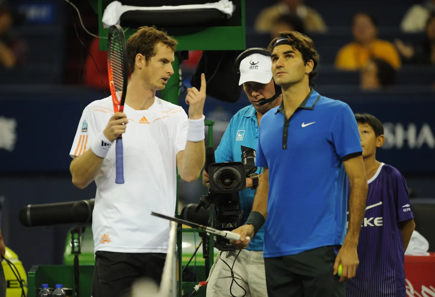Roger Federer (paremal) ja Andy Murray.