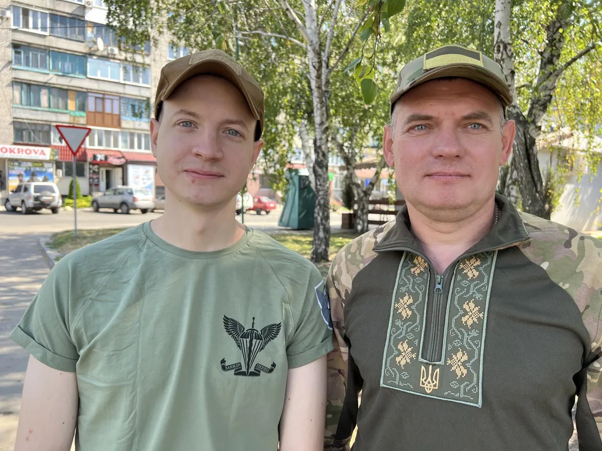 25th Airborne Brigade infantryman Vladislav (on the left) and tanker Oleksandr in the city of Pokrovsk in July.