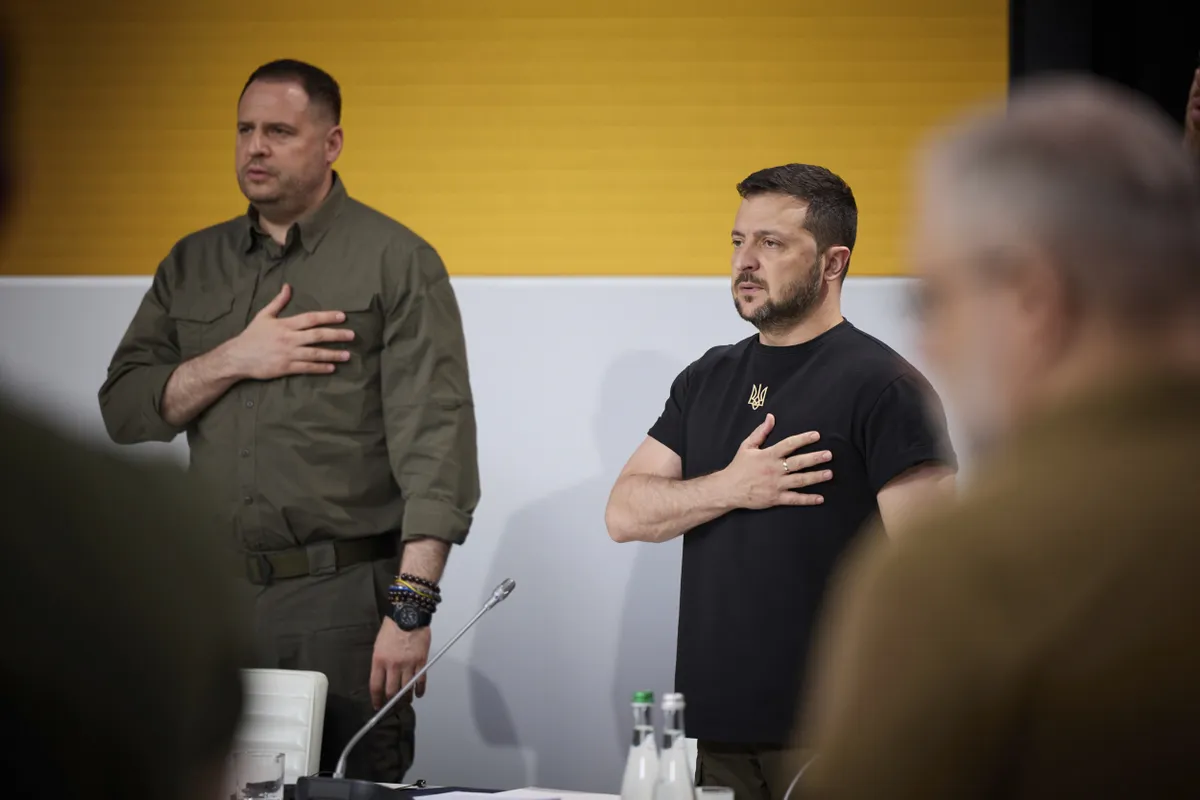 July 30, 2023, Ivano-Frankivsk, Ivano-Frankivsk Oblast, Ukraine: Ukrainian President Volodymyr Zelenskyy, right, and chief of presidential staff Andriy Yermak, left, stand for the national anthem before the start of a congress of local and regional government officials. Critics argue that they have not paid sufficient attention to internal politics.
