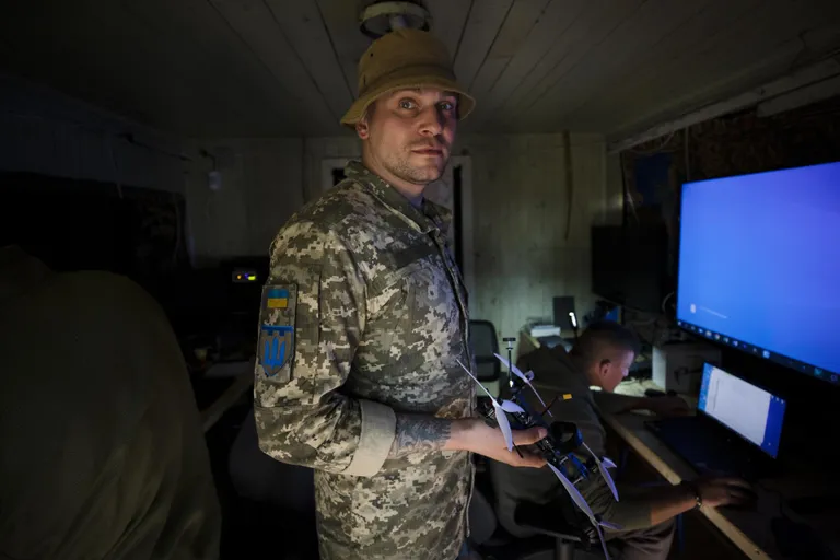 A soldier of the tactical air reconnaissance group Magyar's Birds with the callsign Svjat. In his "previous life" he was a musician in a rock band, now his energy is spent on creative work aimed at enemy positions.