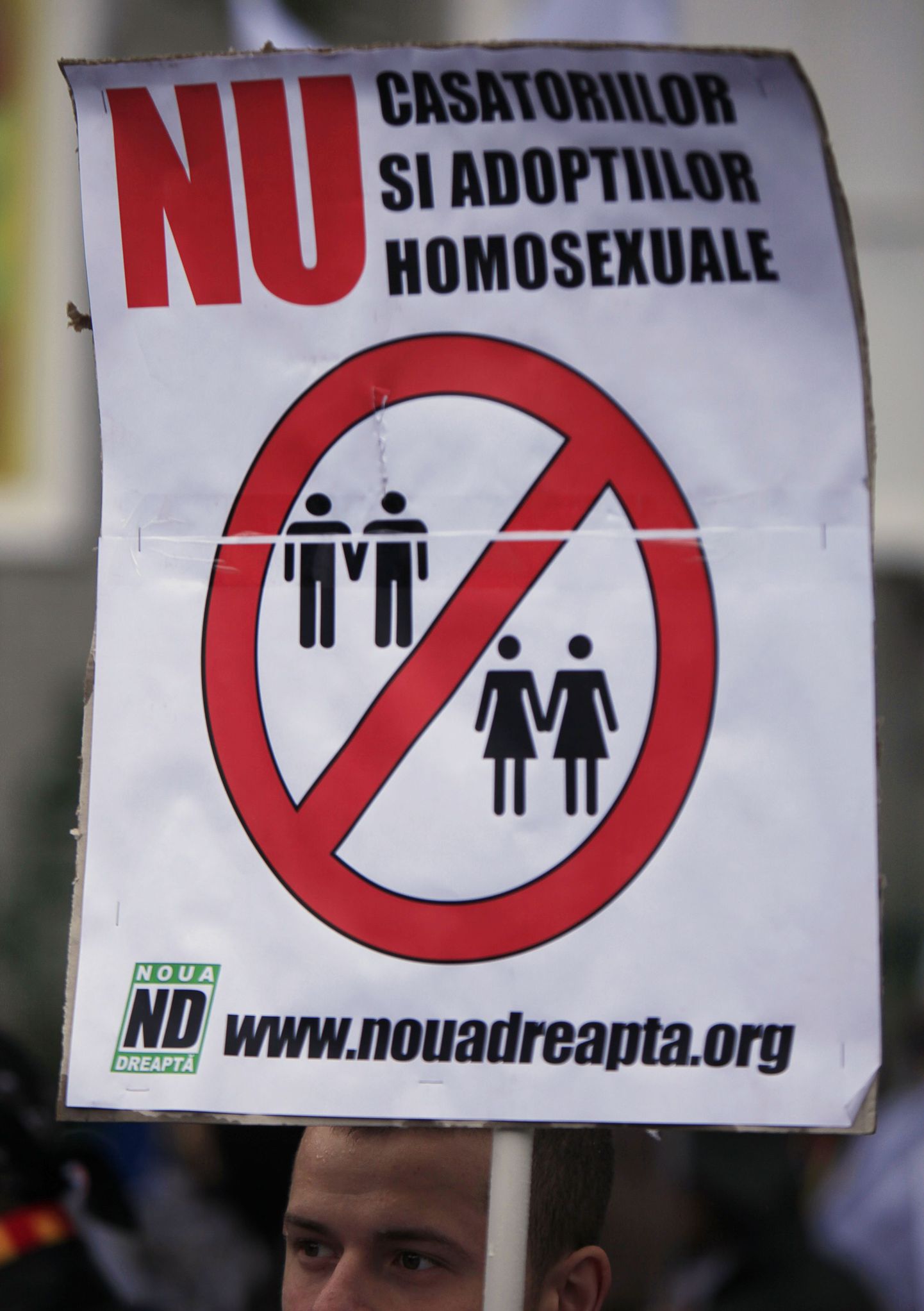 Pildil plakat geidevastaselt meelavalduselt Bukarestis.