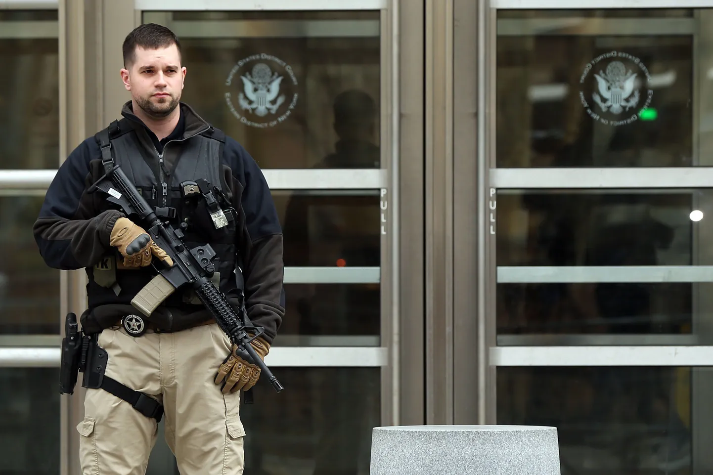 NEW YORK, NY - MARCH 18: An armed U.S. Marshal stands outside of a U.S. Federal court during the arraignment of Tairod Pugh, a former U.S. Air Force mechanic accused of attempting to join the terrorist organization ISIS, on March 18, 2015 in New York City. Pugh, 47 plead not guilty to charges of trying to enter Syria to join ISIS.   Spencer Platt/Getty Images/AFP
== FOR NEWSPAPERS, INTERNET, TELCOS & TELEVISION USE ONLY ==