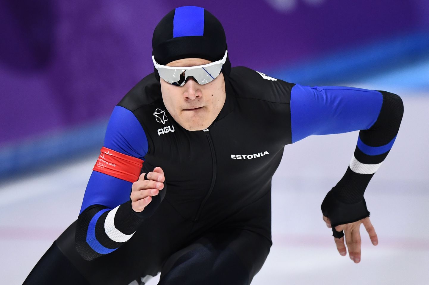 Estonia's Marten Liiv competes in the men's 1,000m speed skating event during the Pyeongchang 2018 Winter Olympic Games at the Gangneung Oval in Gangneung on February 23, 2018. / AFP PHOTO / ARIS MESSINIS