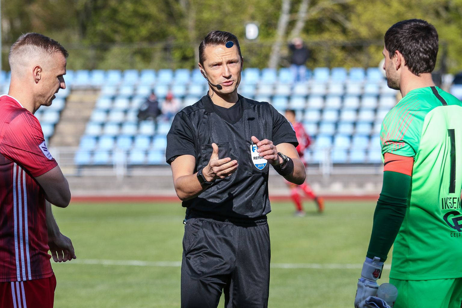 Andris Treimanis (centrā)