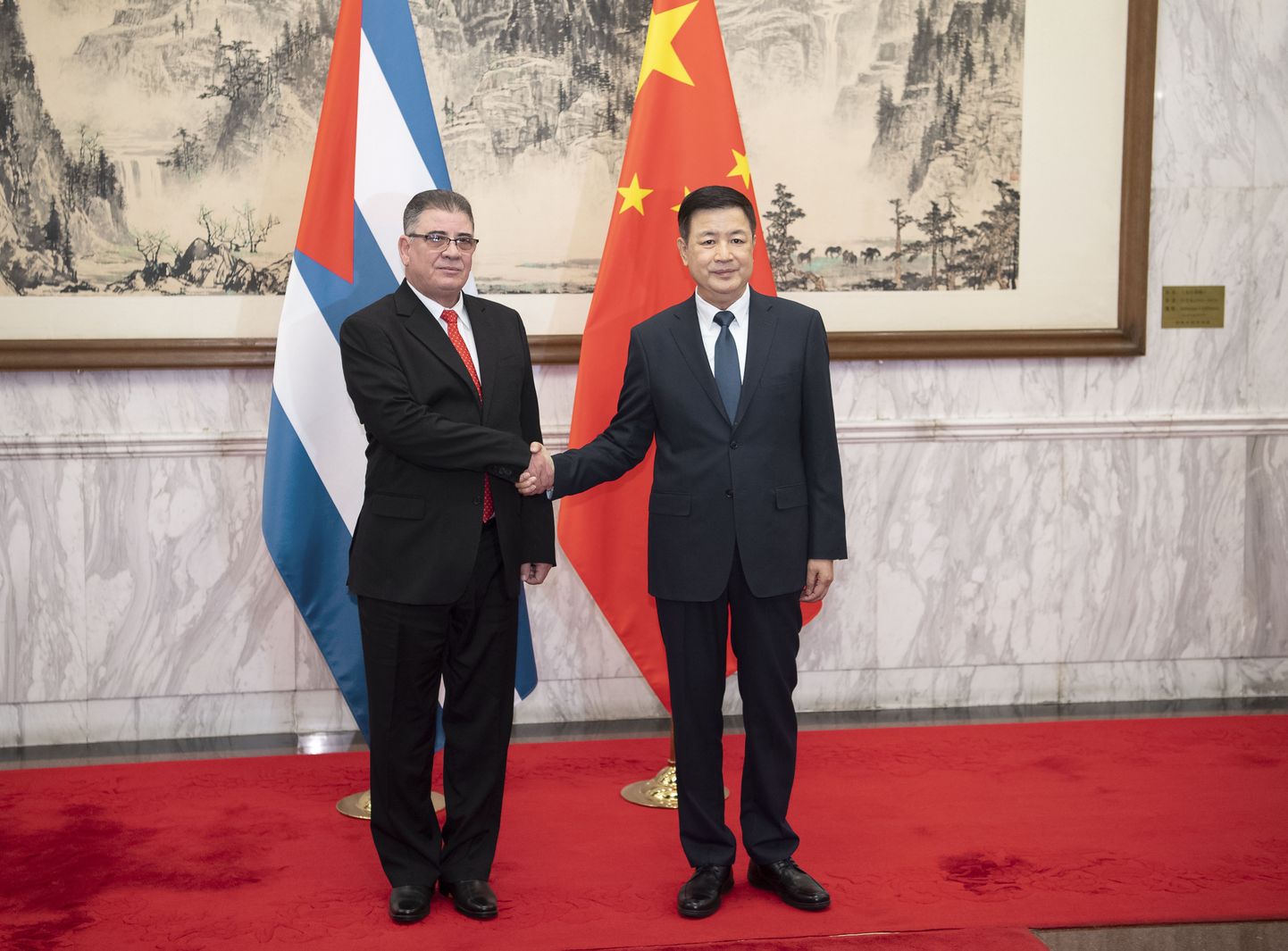 Hiina avaliku julgeoleku minister Wang Xiaohong kohtumas Kuuba siseministri Lazaro Alberto Alvarez Casasega mais Pekingis. Foto on illustratiivne.