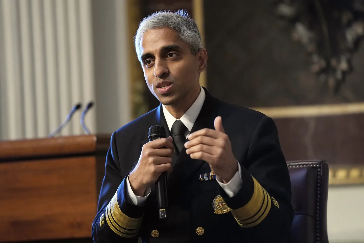 FILE - Surgeon General Dr. Vivek Murthy speaks during an event on the White House complex in Washington, April 23, 2024. Murthy is asking Congress to require warning labels on social media platforms that are similar to those that appear on cigarette boxes. (AP Photo/Susan Walsh, File)  NYPM101