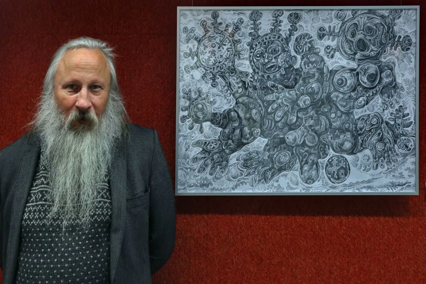 Albert Gulk ja tema joonistus näitusel Physicumi galeriis.