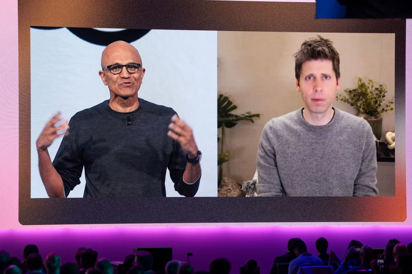 Microsoft Chairman and Chief Executive Officer Satya Nadella (L), speaks with OpenAI Chief Executive Officer Sam Altman, who joined by video during the Microsoft Build 2025, conference in Seattle, Washington on May 19, 2025. (Photo by Jason Redmond / AFP)