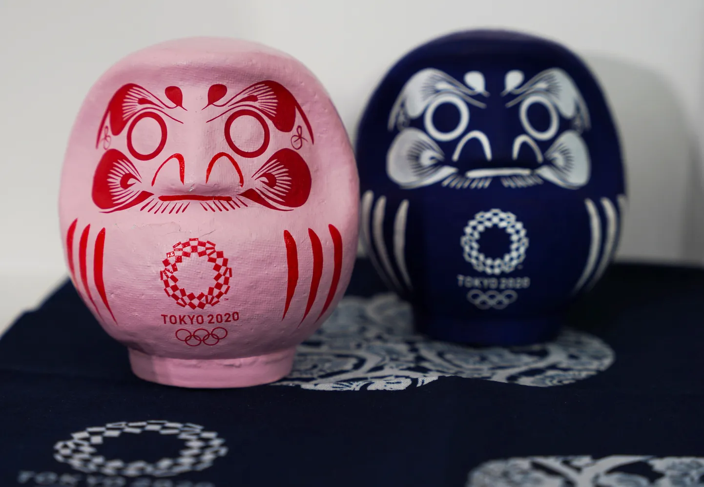 Japanese traditional Daruma dolls are displayed at an event presenting the Tokyo 2020 'Traditional Crafts Collection' series of licenced merchandise, traditional crafts from all of Japan's 47 prefectures, bearing the Tokyo 2020 emblem, in Tokyo, Japan April 15, 2021.  REUTERS/Chris Gallagher