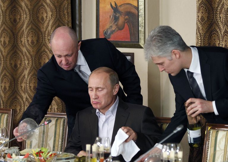 Пригожин и Путин. (AP Photo/Misha Japaridze, Pool, File)