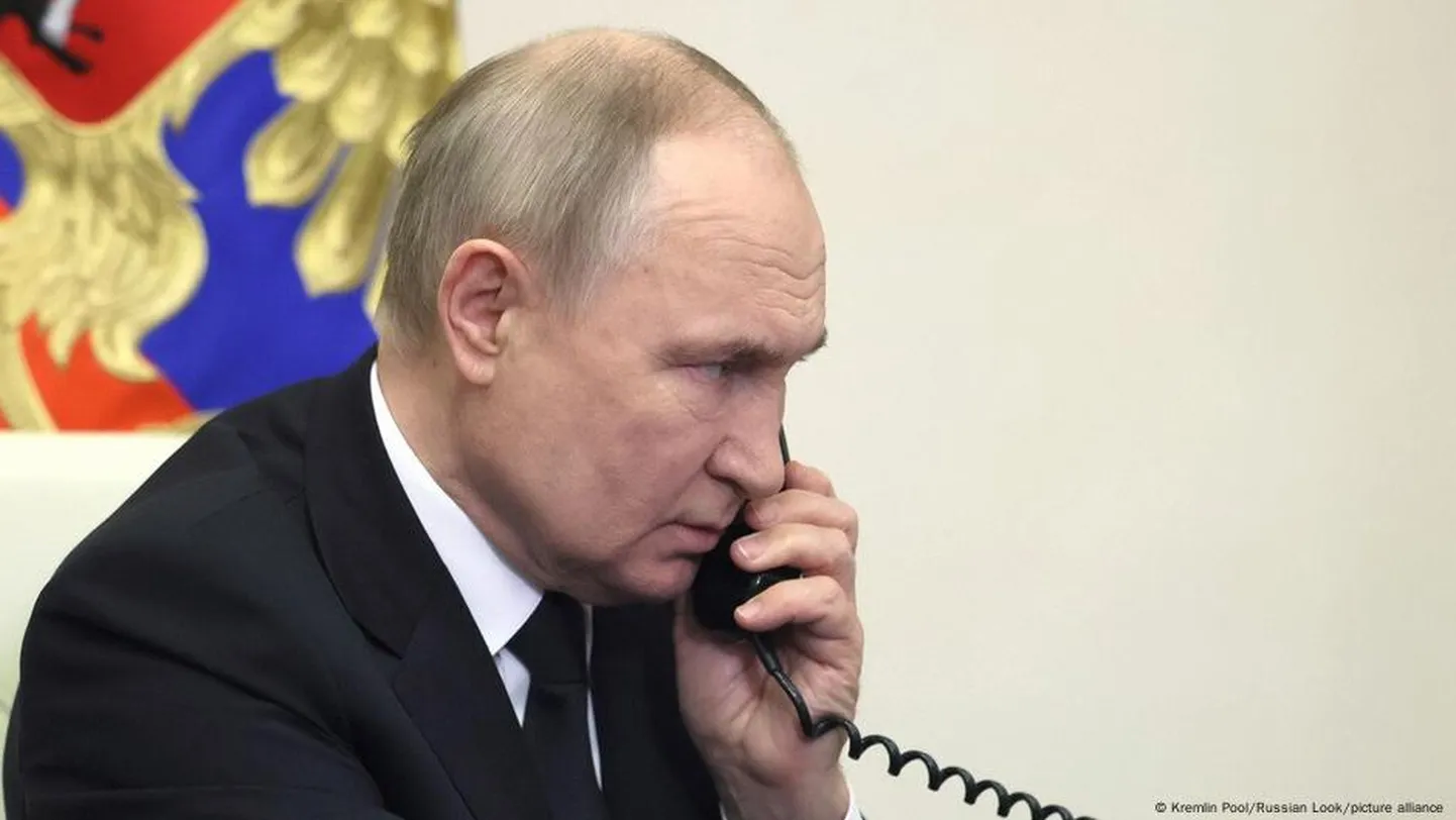 Путин