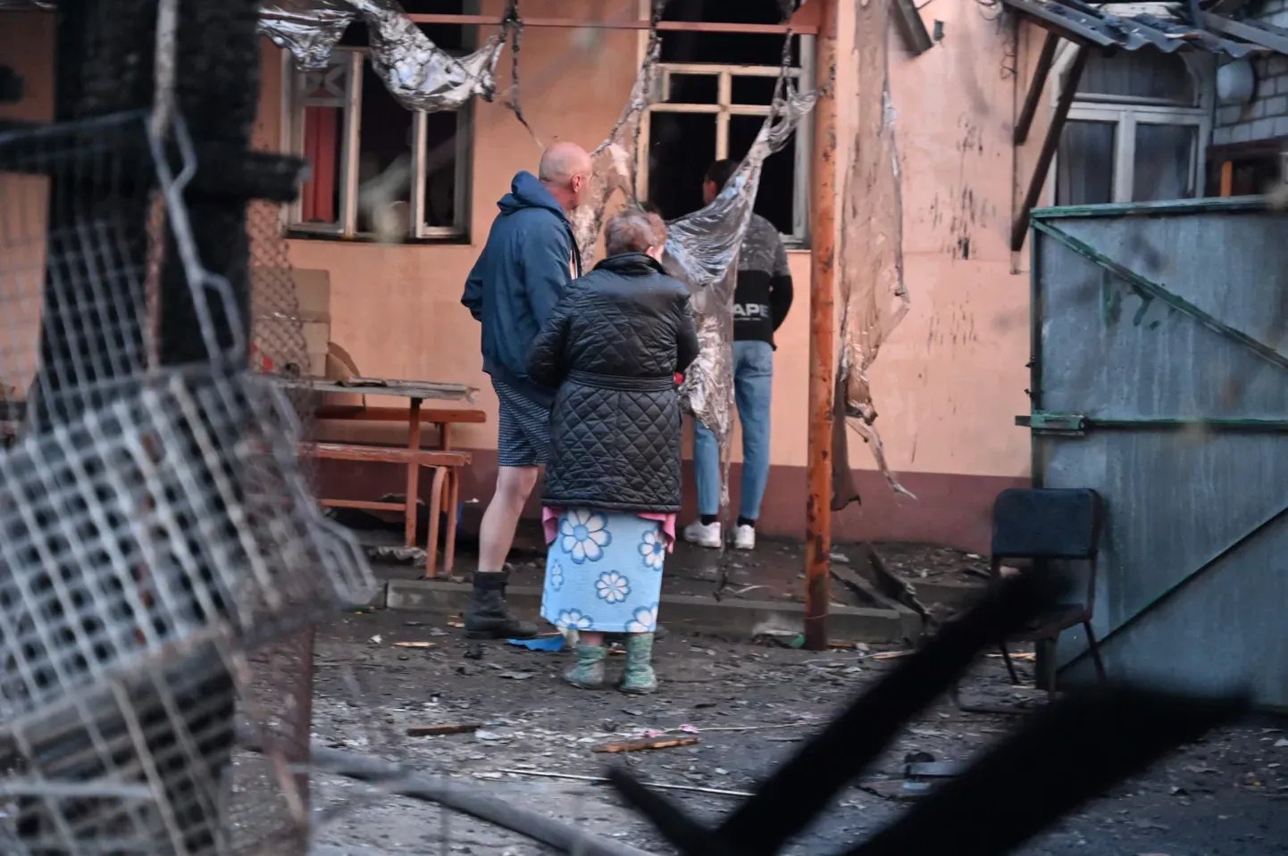 Поврежденный в результате российской дроновой атаки дом в Харькове.