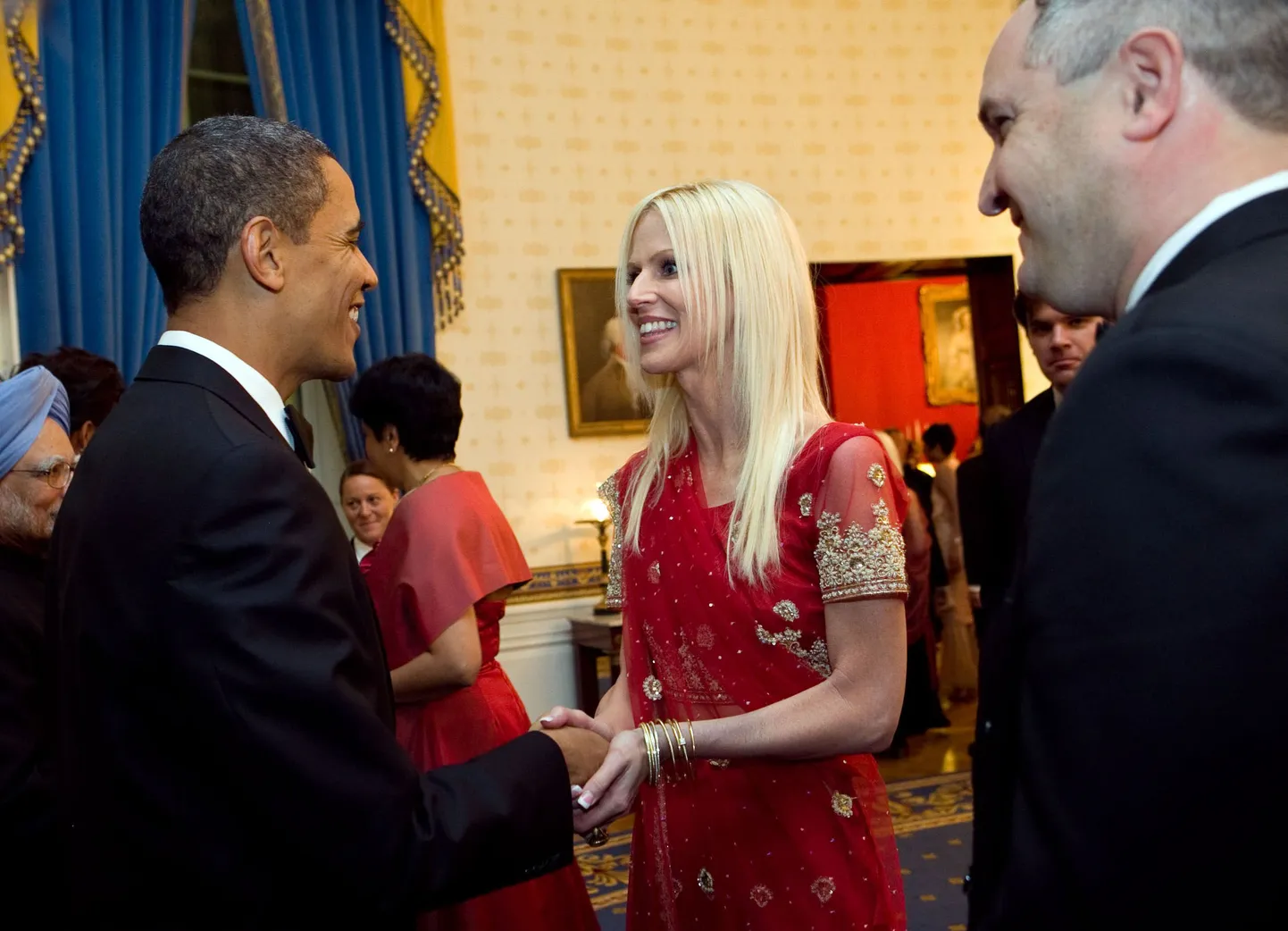 Michaele ja Tareq Salahi president Barack Obamaga kätlemas