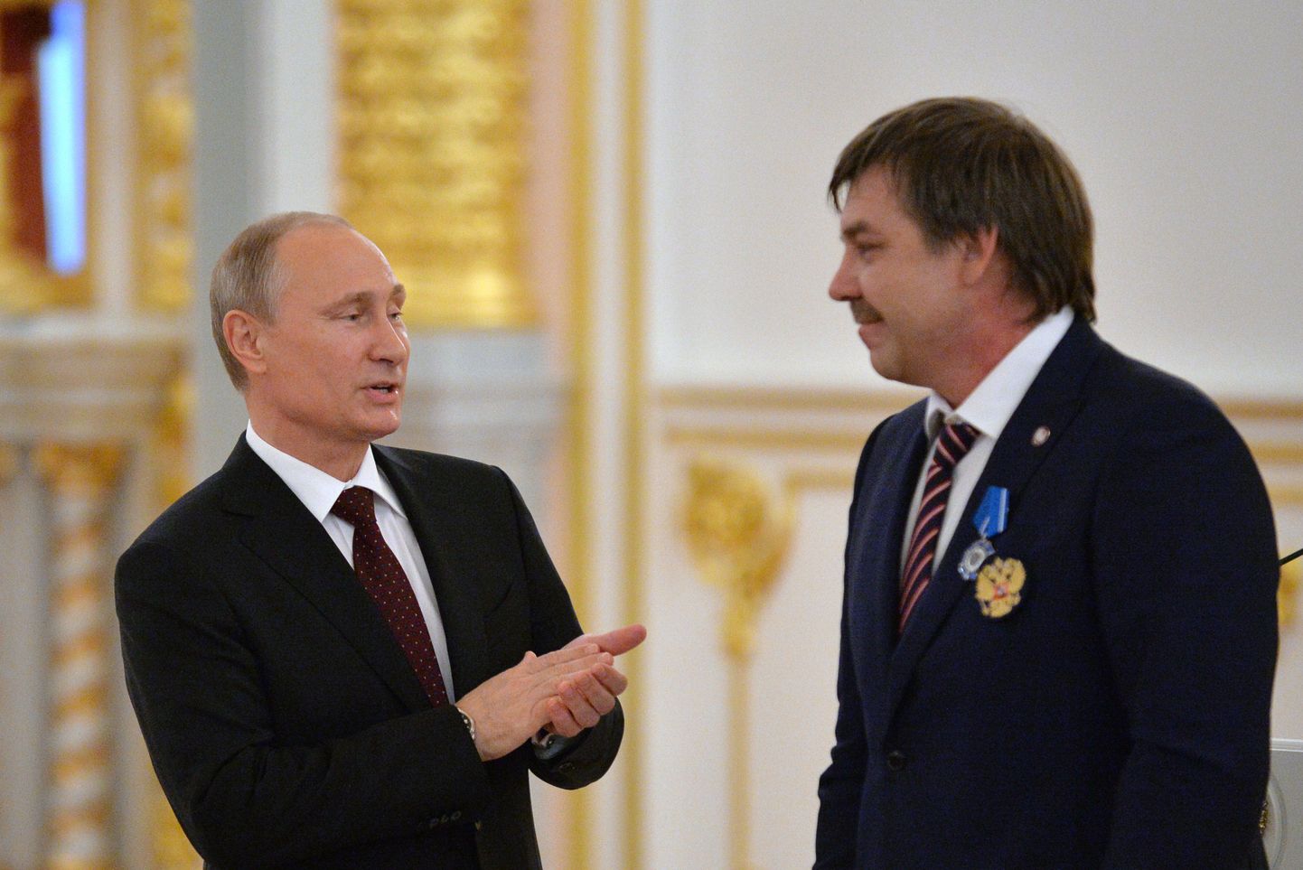 Владимир Путин и Олег Знарок.