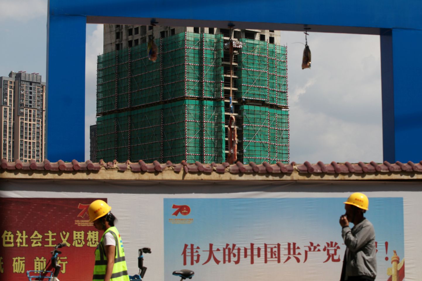 Töölised Hiinas Kunmingis asuval ehitusplatsil.