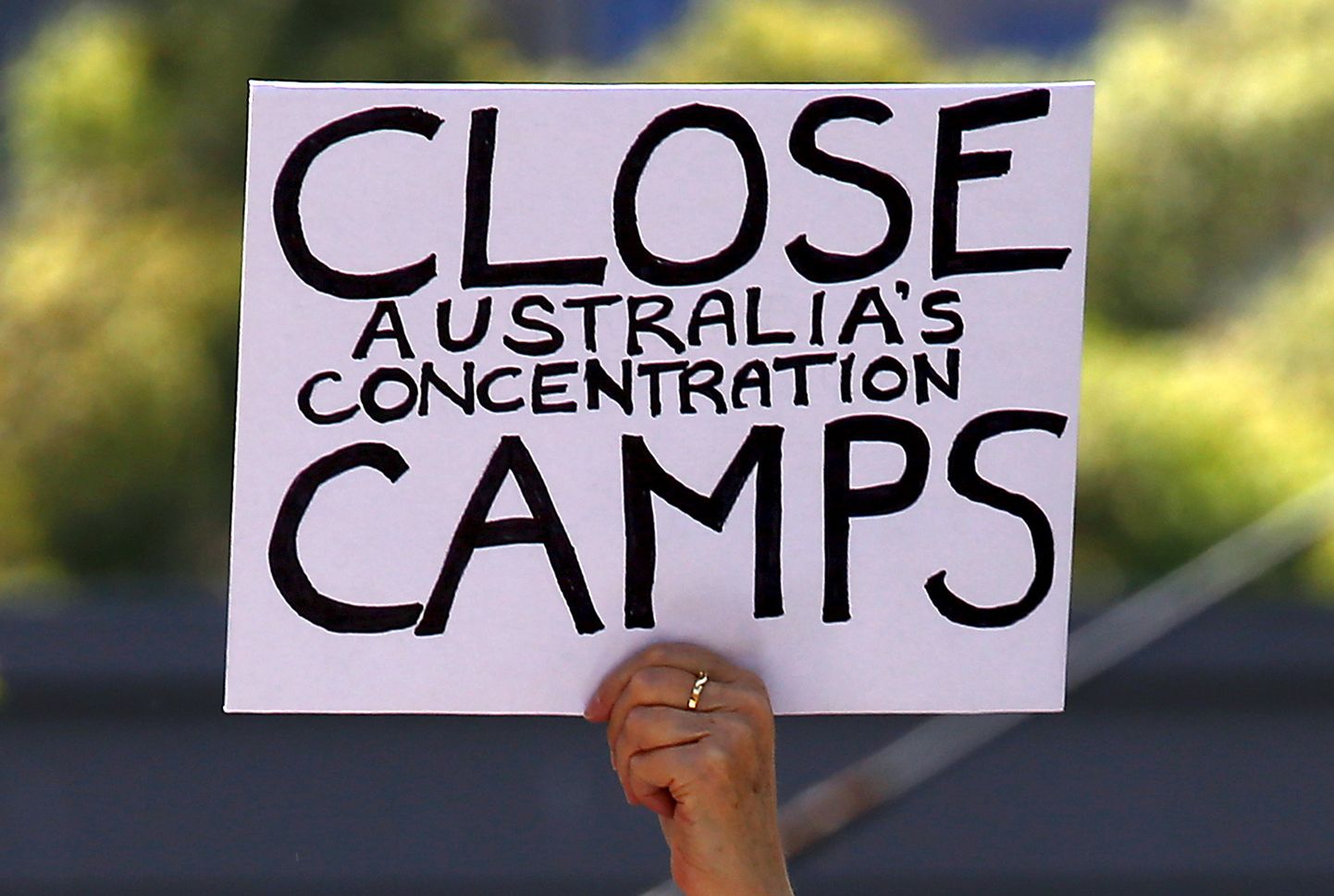 Meeleavaldaja 2015. aastal Sydneys Austraalia valitsuse põgenikepoliitika vastu protestimas.