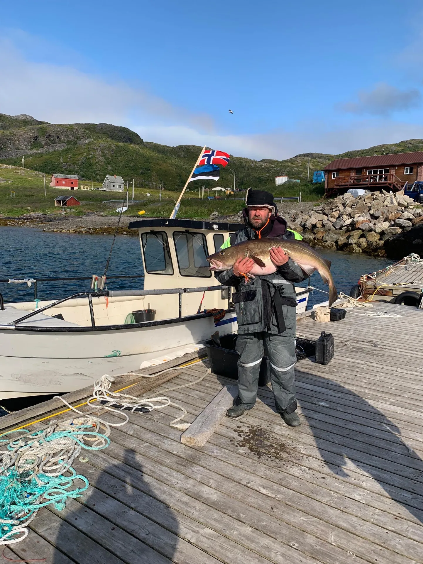 Otepää vallavanem Kaido Tamberg Norras püütud 18-kilose tursaga.