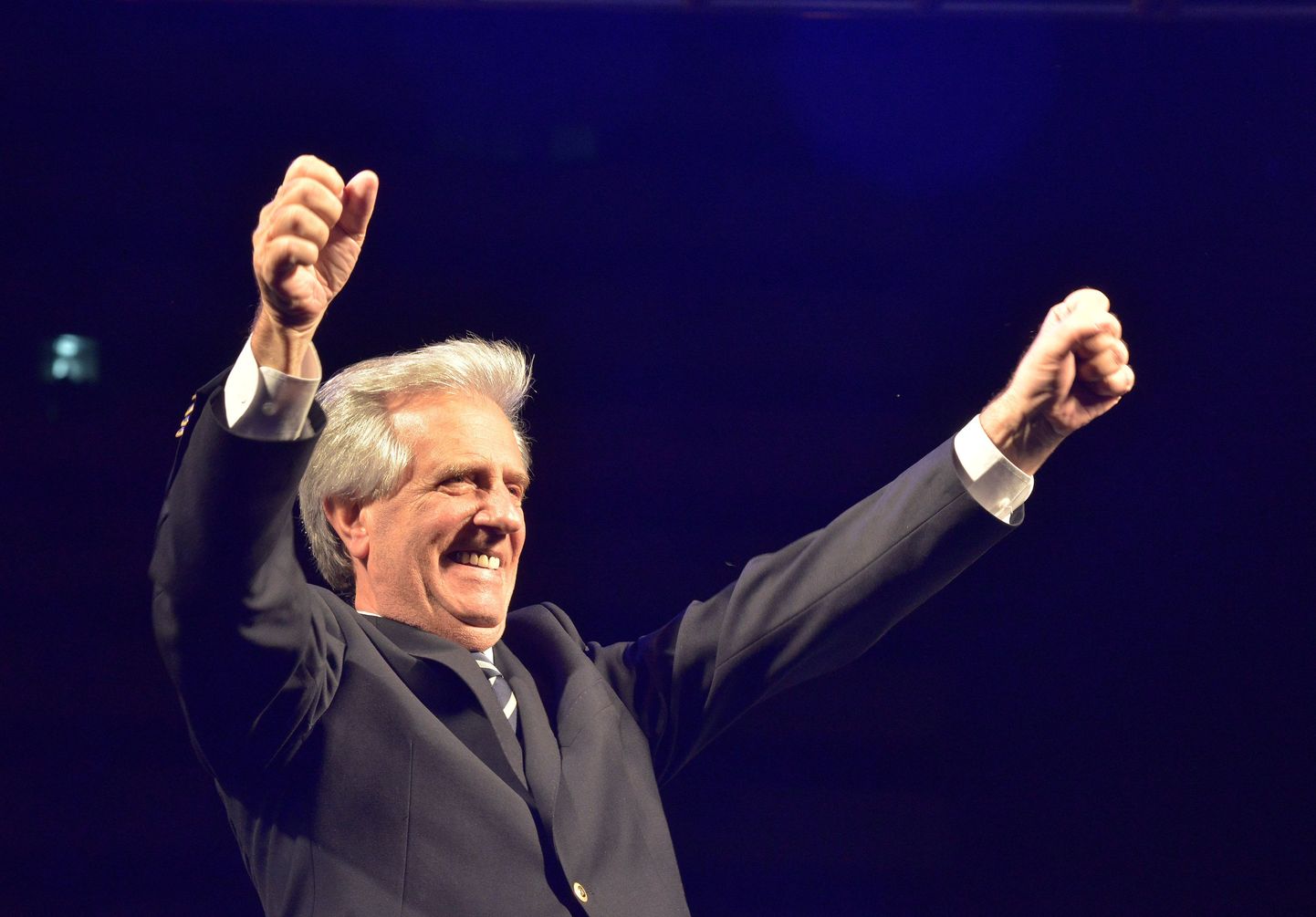 Elected President Tabare Vazquez gestures during a celebration rally in Montevideo after knowing the results of a runoff election, November 30, 2014. Vazquez won back his old job as president of Uruguay in the runoff election on Sunday, allowing the leftist ruling coalition to extend its decade in power and roll out a law legalizing the production and sale of marijuana.  REUTERS/Carlos Pazos (URUGUAY - Tags: POLITICS ELECTIONS)