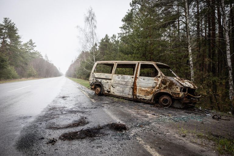 Burned minibus on the highway to Slavutych. Territorial defenders fought battles with Russian forces on the road to the city for three days.